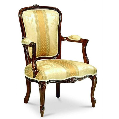 Ornate armchair with dark wooden legs and yellow fabric
