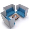 3 blue and grey booth sofas and a square coffee table