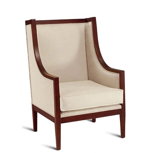 High-backed cream armchair with dark wooden edging