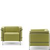 Two green lounge chairs