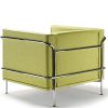 Side angle view of green armchair