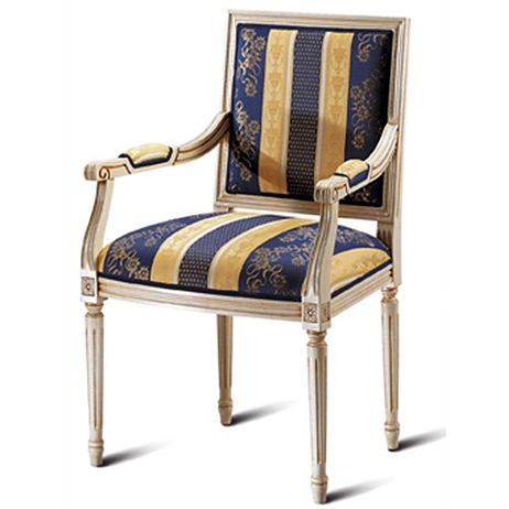 Ornate chair upholstered in a striped yellow and blue fabric