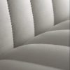 Close up of fluted stitching on white chair