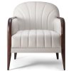 White armchair with wooden legs
