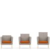Three grey and orange armchairs with different backs