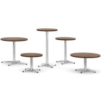 5 round tables in various sizes and heights